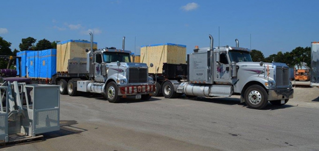 Trade-Mark trucks moving equipment